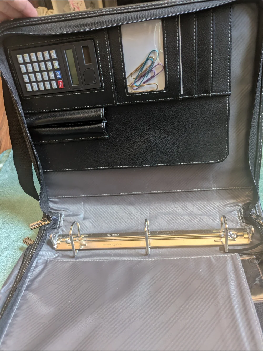 Samsonite Black Leather Messenger Bag with Metal Accents